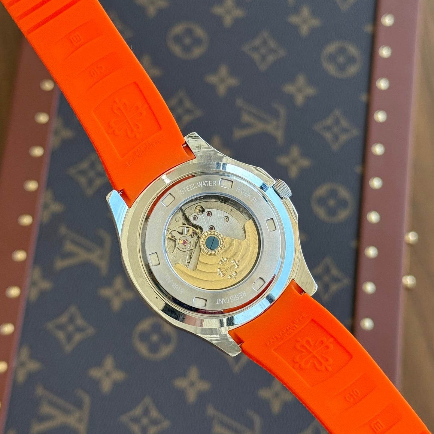 Aquanaut Steel – Orange Dial Rubber Strap Type Patek