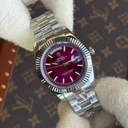 Reloj Kronos Day-Date Oystersteel esfera cherry dial acero inoxidable detalle
